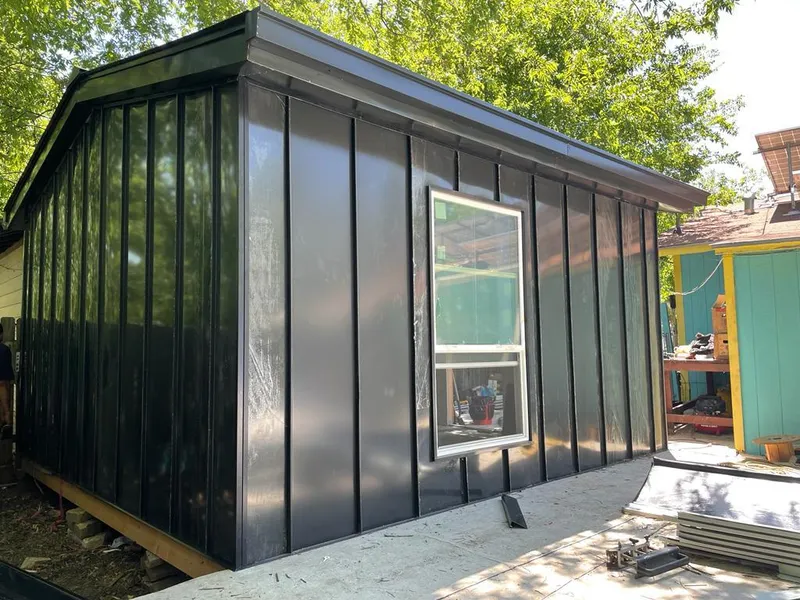 Black standing seam metal wall panels for Metal Roof Installation in Torrington