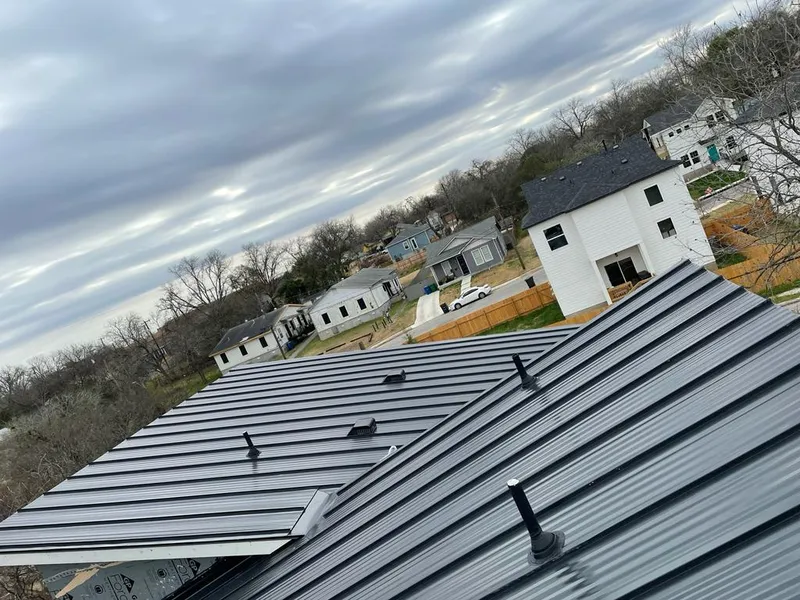 Standing seam metal roof panels with vents for Skylight Repair in Torrington